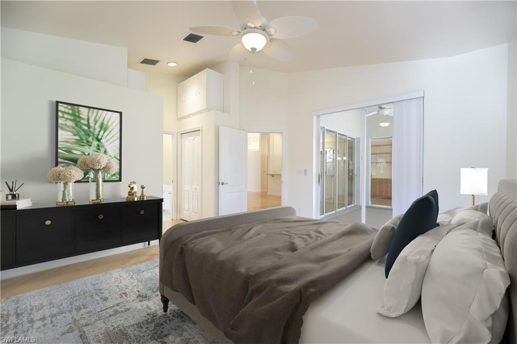 20951 Rivers Ford Estero, FL 33928 - Photo 31 of 49 a bedroom with a bed and a dresser