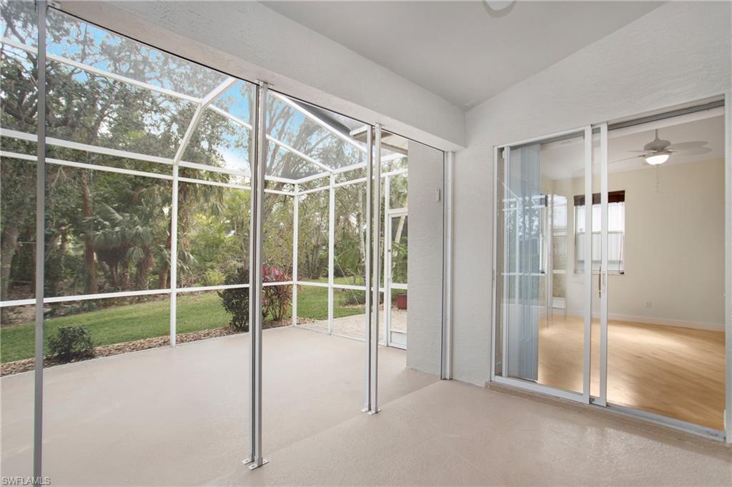 20951 Rivers Ford Estero, FL 33928 - Photo 35 of 49 a view of an empty room with floor to ceiling window