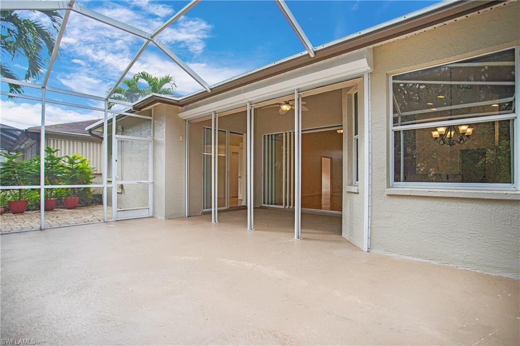 20951 Rivers Ford Estero, FL 33928 - Photo 38 of 49 a view of an empty room with a sliding door