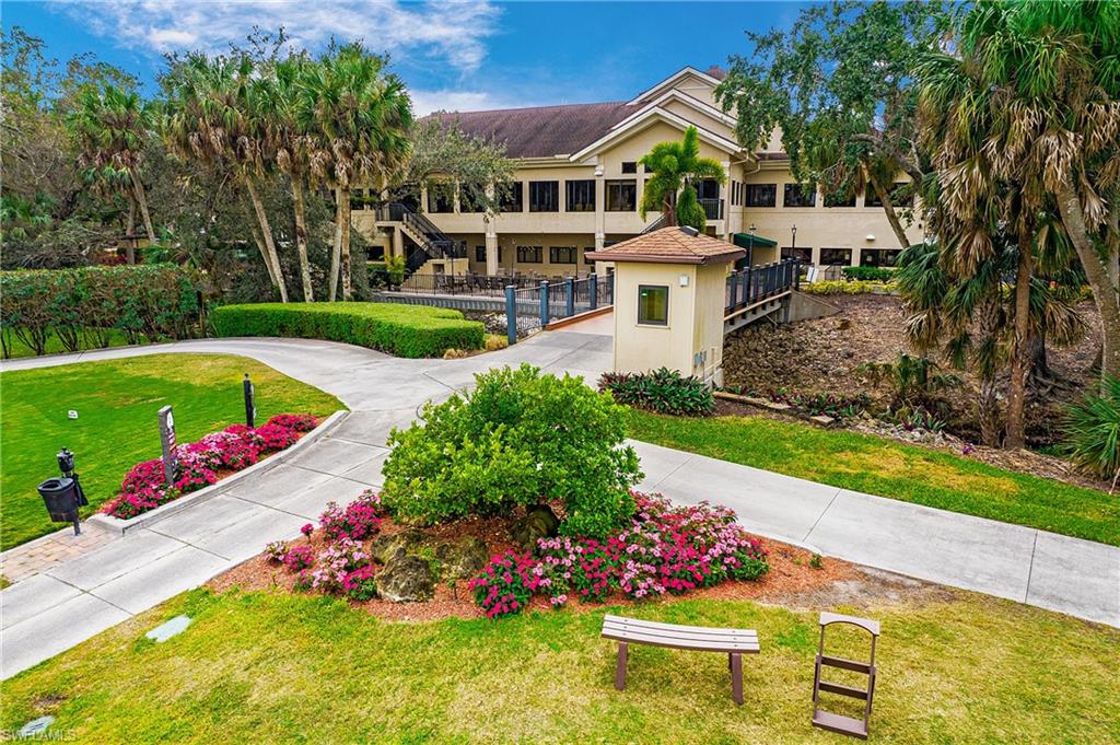 20951 Rivers Ford Estero, FL 33928 - Photo 44 of 49 a view of a house with a garden and swimming pool