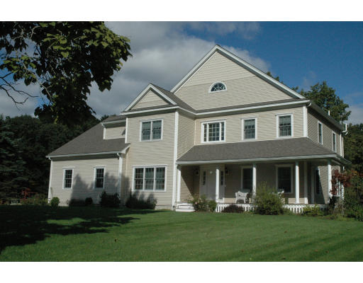 7 Brownloaf Road Groton, MA 01450 - Photo 1 of 1 a front view of a house with a garden
