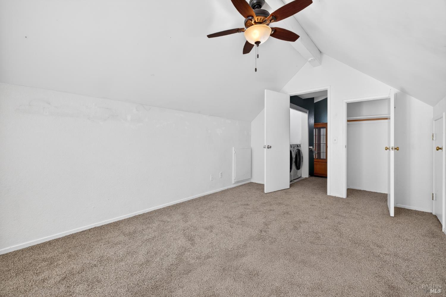 2757 Lakeview Drive Santa Rosa, CA 95405 - Photo 39 of 54 an empty room with closet and a ceiling fan