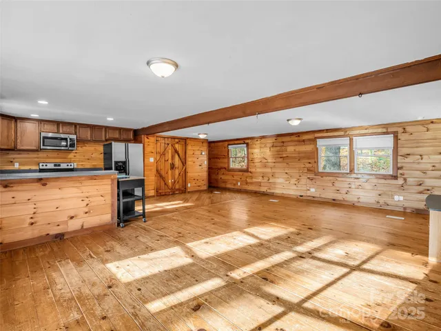 a view of a kitchen with a sink