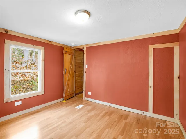 an empty room with windows