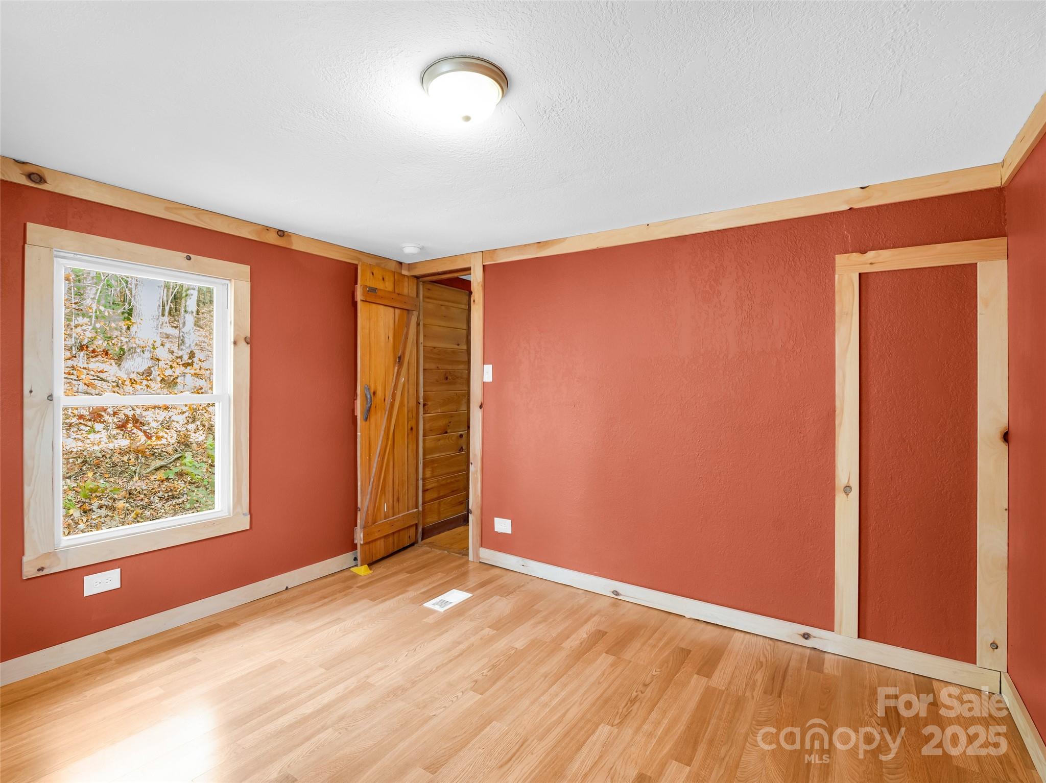 3620 Howard Gap Road Saluda, NC 28773 - Photo 33 of 35 an empty room with windows