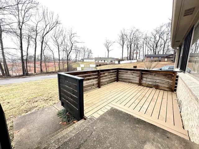 a view of a terrace with trees