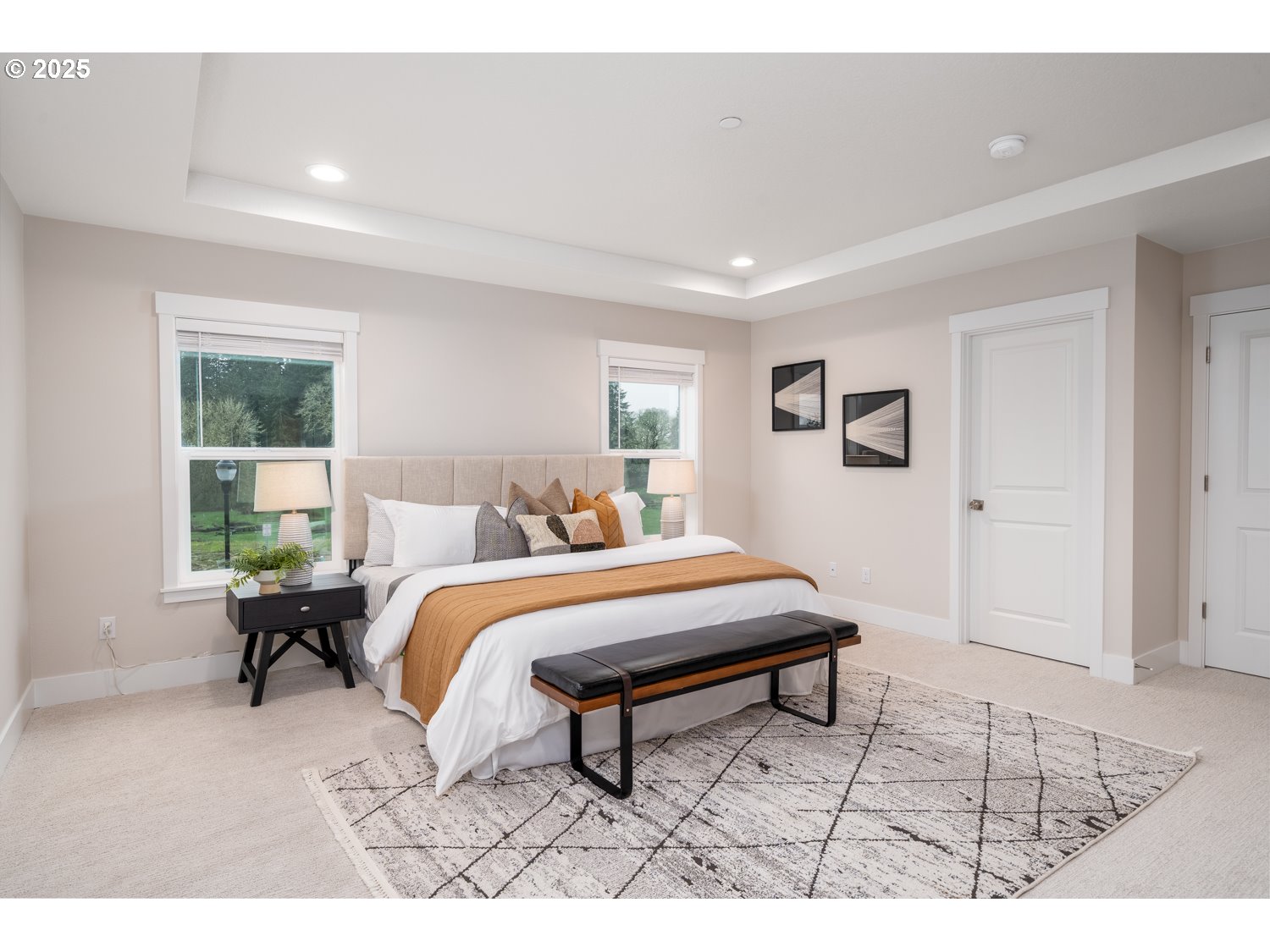 1392 North Kalani Loop, Unit LOT 57 Ridgefield, WA 98642 - Photo 41 of 47 a bedroom with a bed a table and windows
