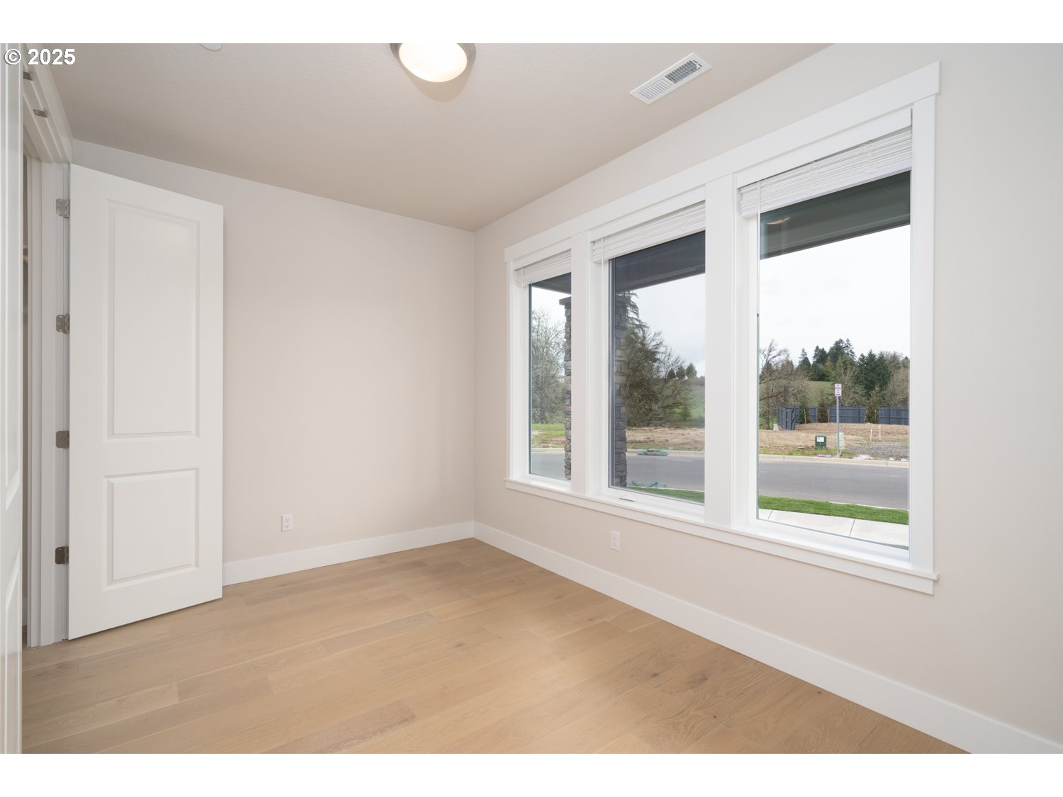 1392 North Kalani Loop, Unit LOT 57 Ridgefield, WA 98642 - Photo 6 of 47 a big room with wooden floor and windows