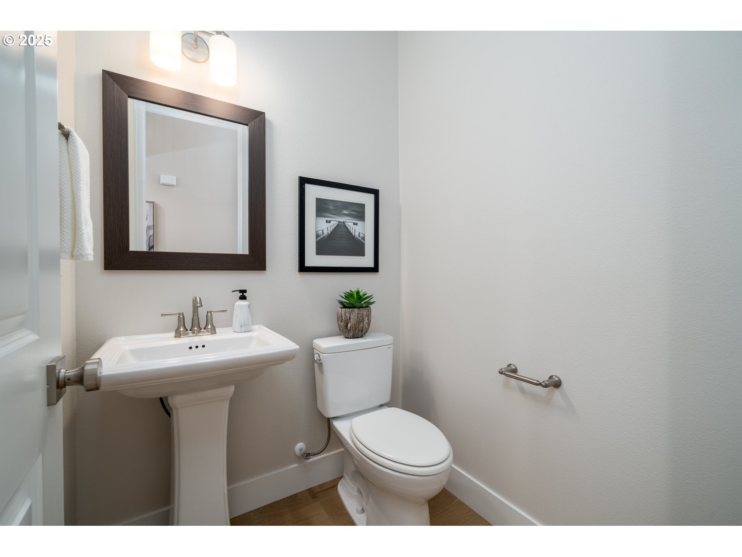 1392 North Kalani Loop, Unit LOT 57 Ridgefield, WA 98642 - Photo 8 of 47 a bathroom with a toilet sink and mirror