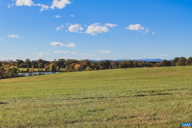 a view of an ocean and city