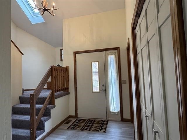 43 West Meadow Road, Unit 43 Haverhill, MA 01832 - Photo 5 of 42 a view of entryway with wooden floor and stairs