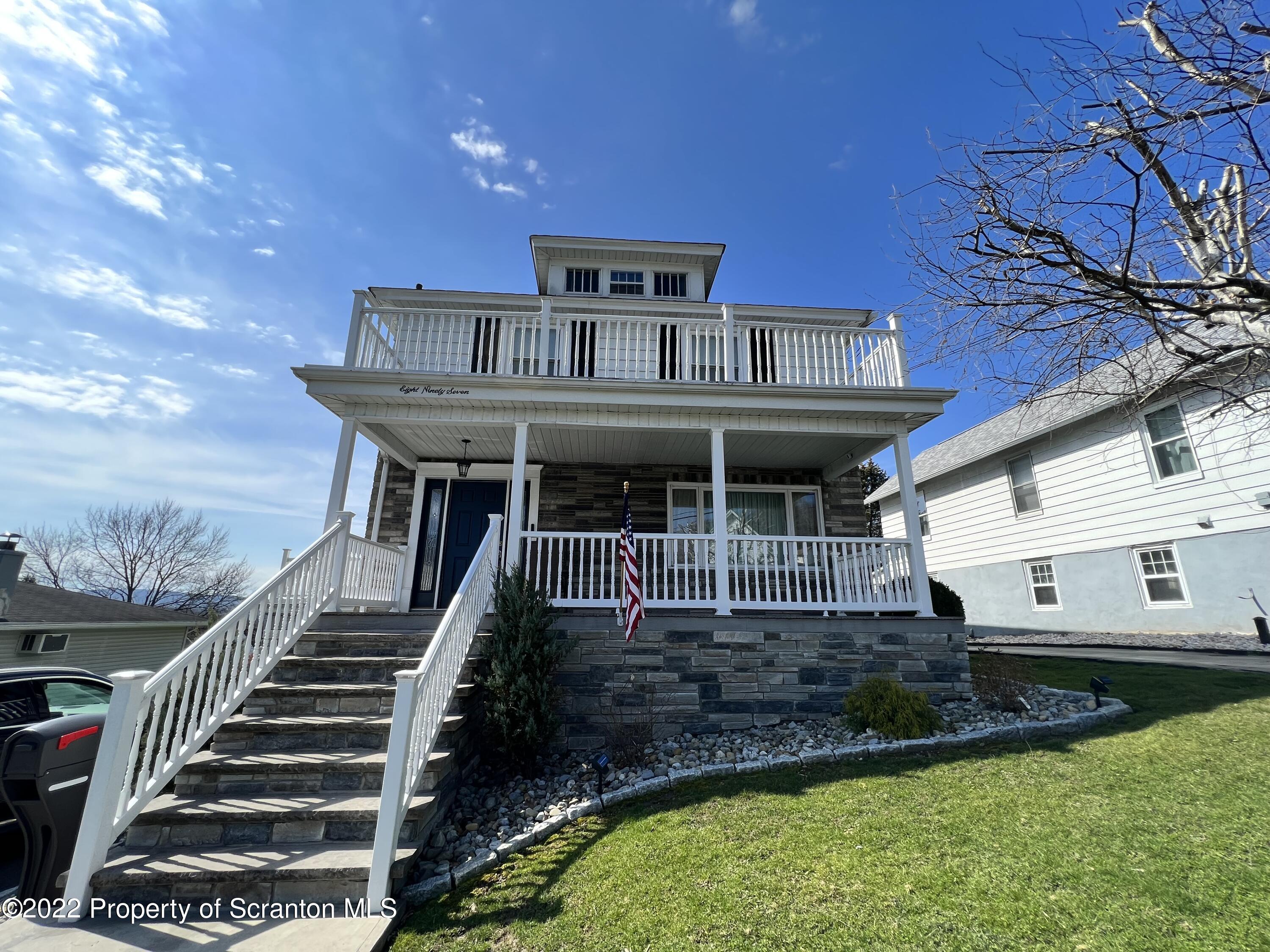 897 Scott Road Dickson City, PA 18519 - Photo 1 of 18 a front view of a house with a yard