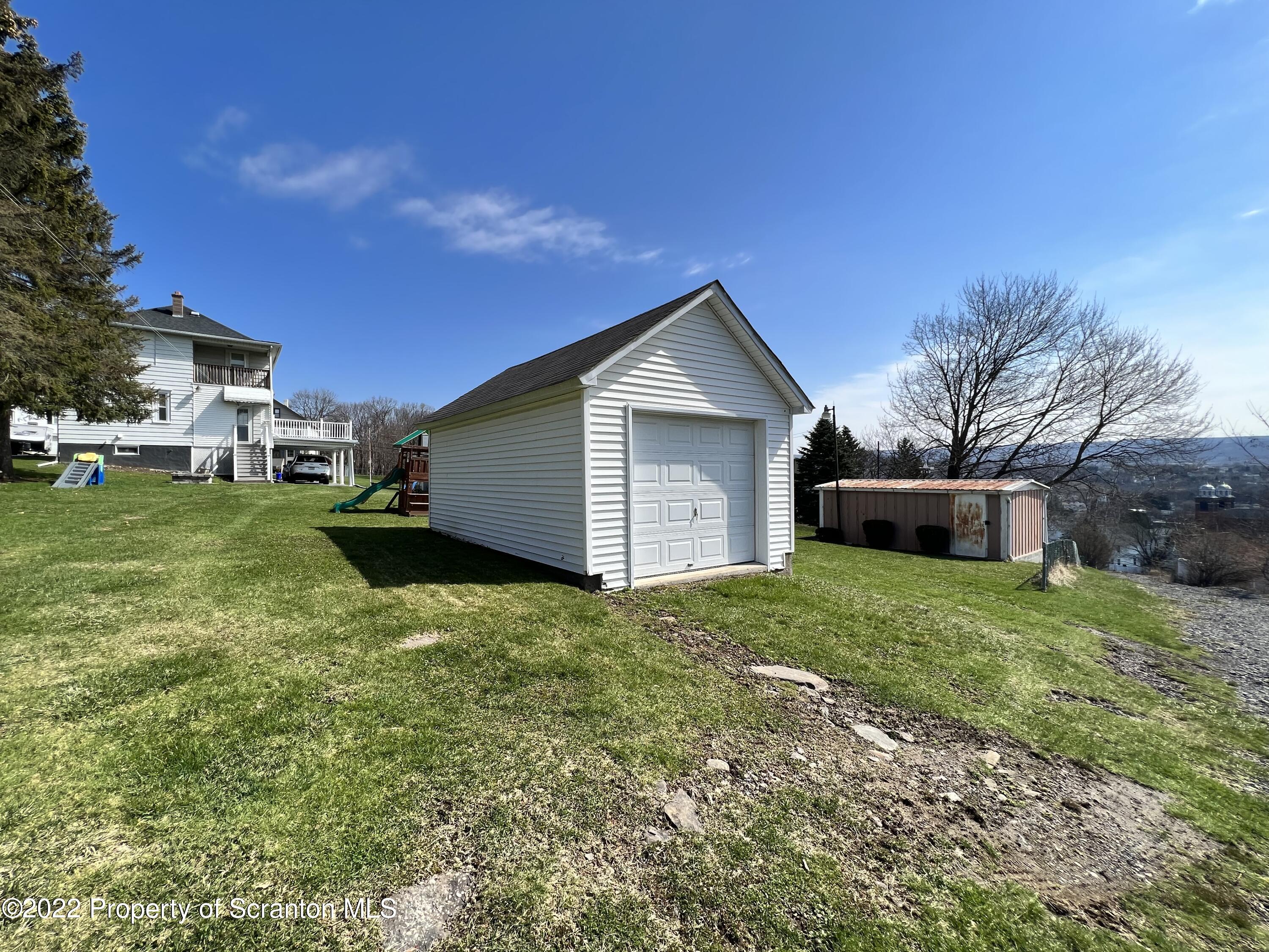 897 Scott Road Dickson City, PA 18519 - Photo 18 of 18 a view of a house with a yard