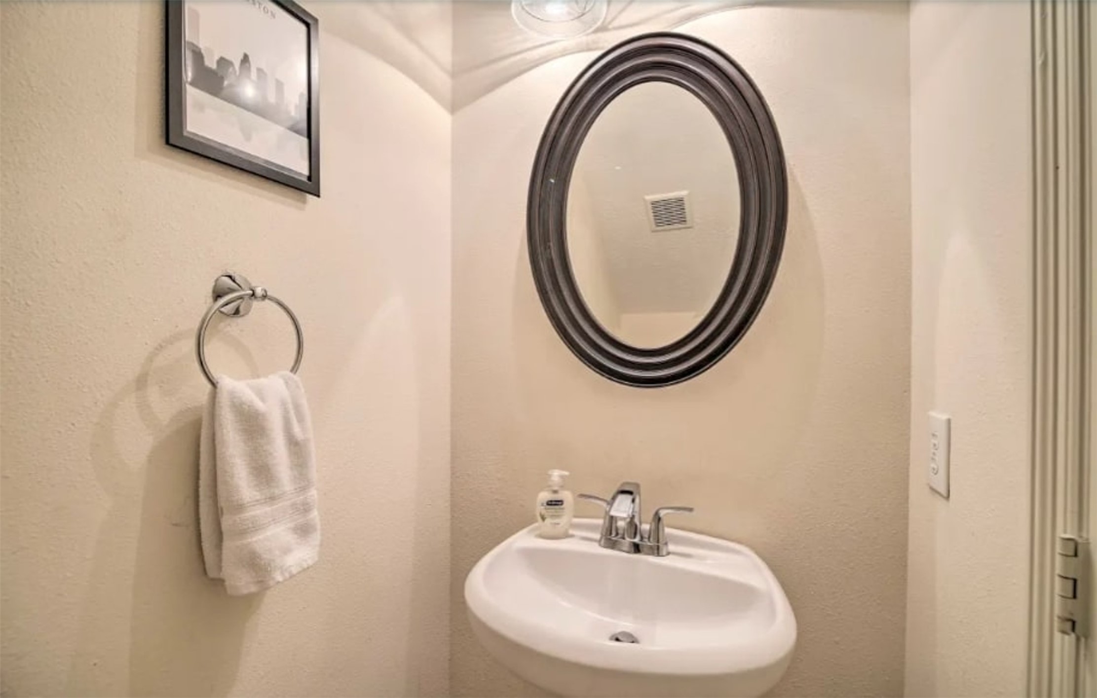 1006 Rochow Street, Unit A Houston, TX 77019 - Photo 13 of 29 Half bathroom downstairs