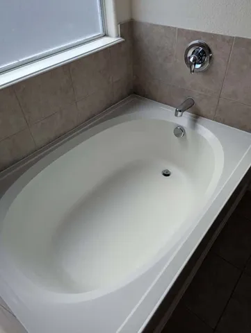 a bathroom with a bathtub