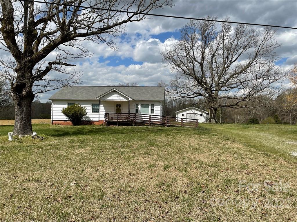 1406 Circle S Ranch Road Monroe, NC 28112 - Photo 3 of 3 a front view of a house with garden