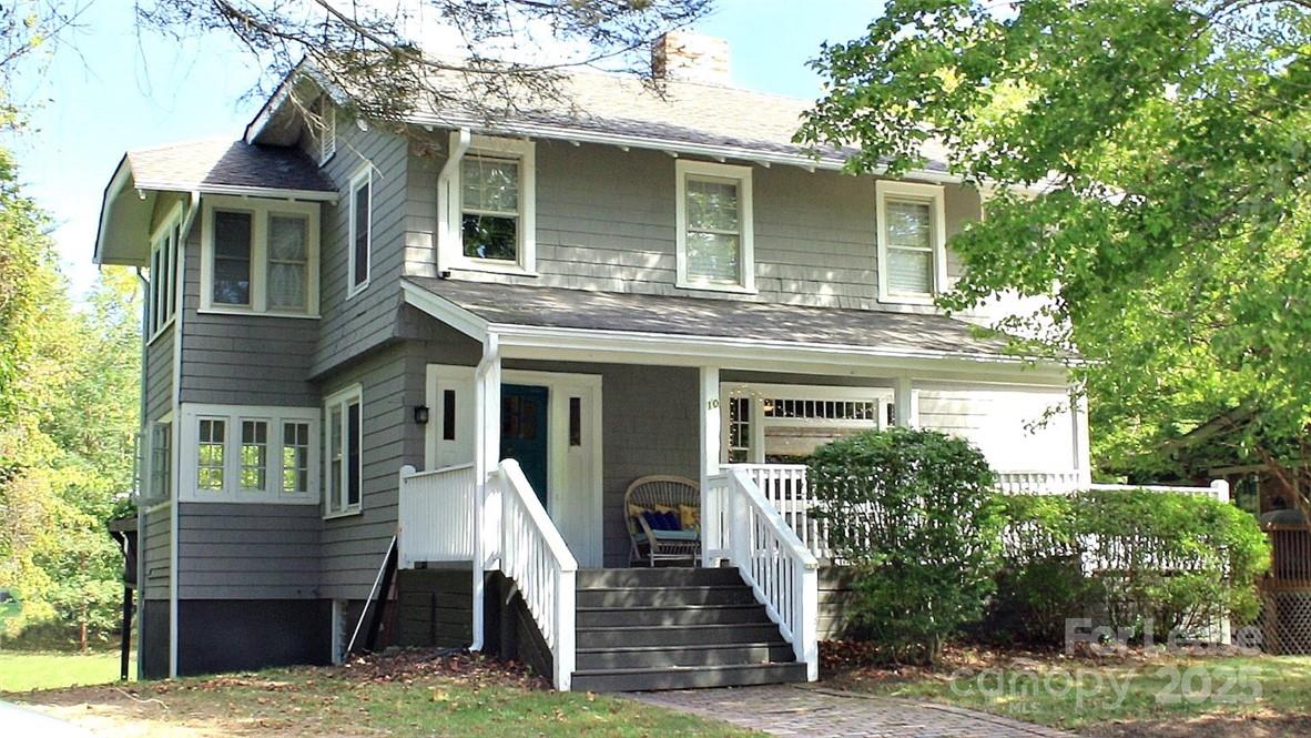 10 Coleman Avenue Asheville, NC 28801 - Photo 1 of 13 front view of house with a yard