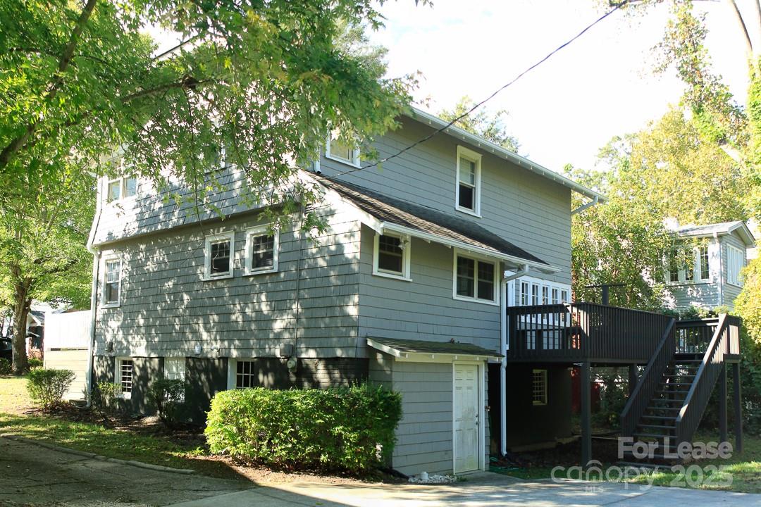 10 Coleman Avenue Asheville, NC 28801 - Photo 2 of 13 a front view of a house with garden