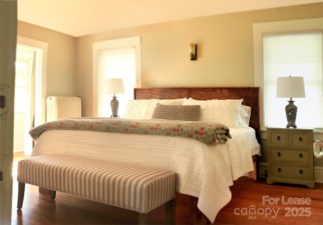 10 Coleman Avenue Asheville, NC 28801 - Photo 6 of 13 a bedroom with a bed and window