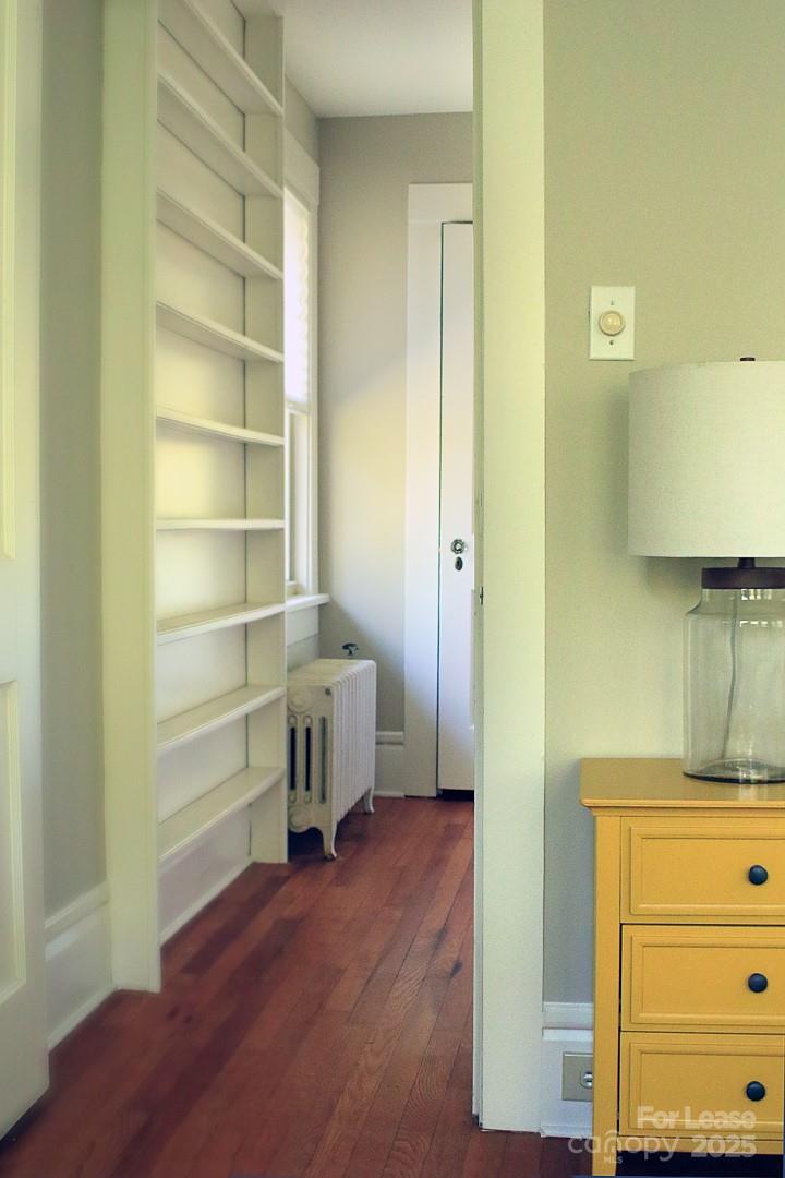 10 Coleman Avenue Asheville, NC 28801 - Photo 8 of 13 a view of walk in closet with empty racks