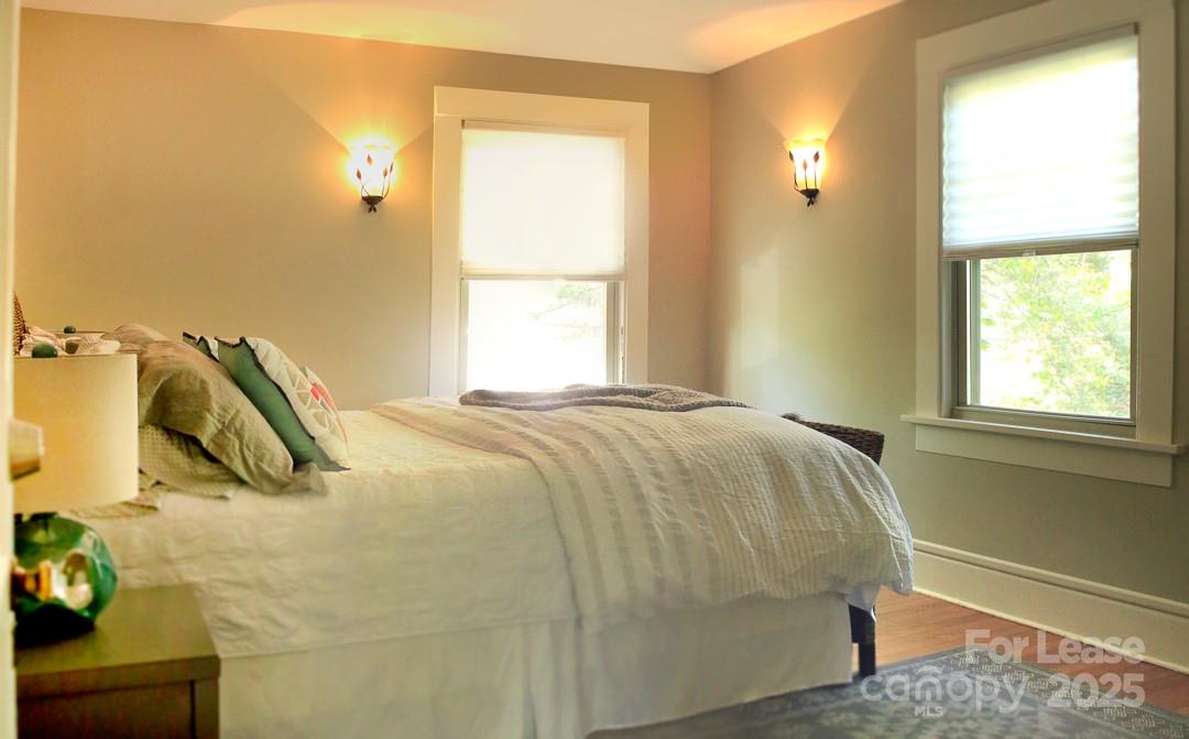 10 Coleman Avenue Asheville, NC 28801 - Photo 9 of 13 a bedroom with a bed and a window