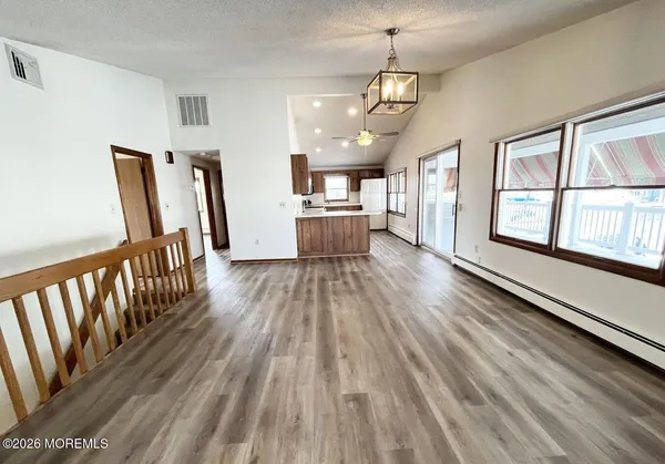 a view of a house with wooden floor