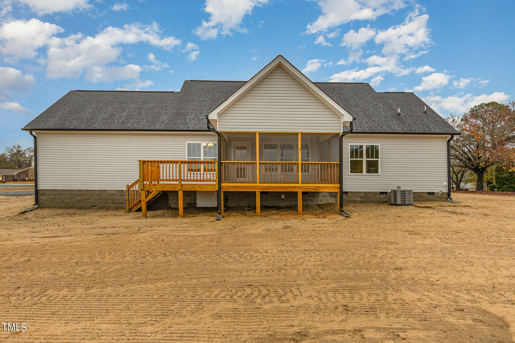7882 Highway 27 Coats, NC 27521 - Photo 3 of 13 a view of a house with a yard
