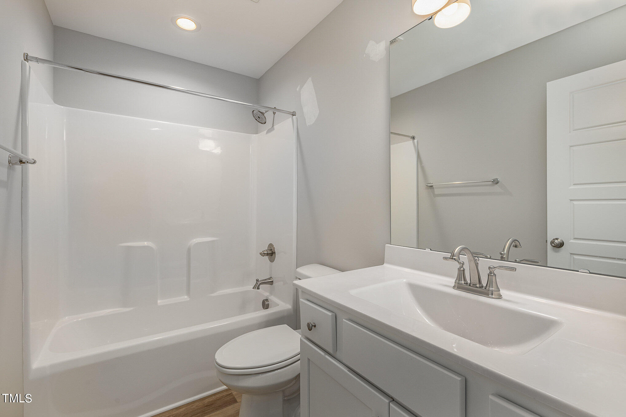 7882 Highway 27 Coats, NC 27521 - Photo 9 of 13 a bathroom with a sink toilet and shower