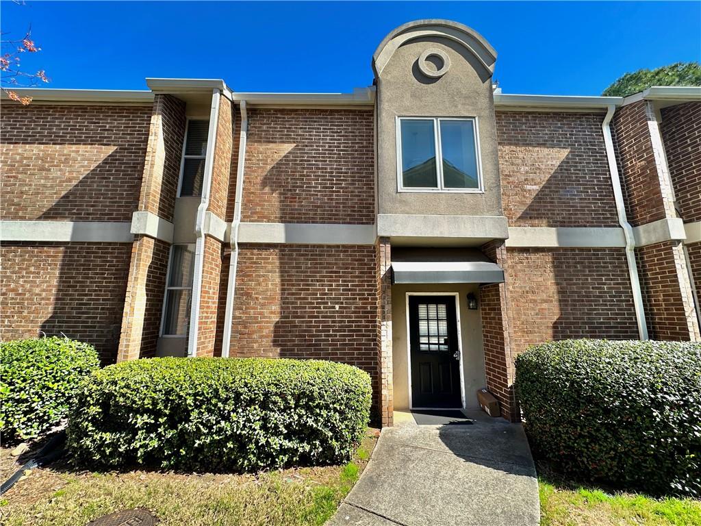 3301 Henderson Mill Road, Unit D6 Chamblee, GA 30341 - Photo 1 of 1 a front view of a house