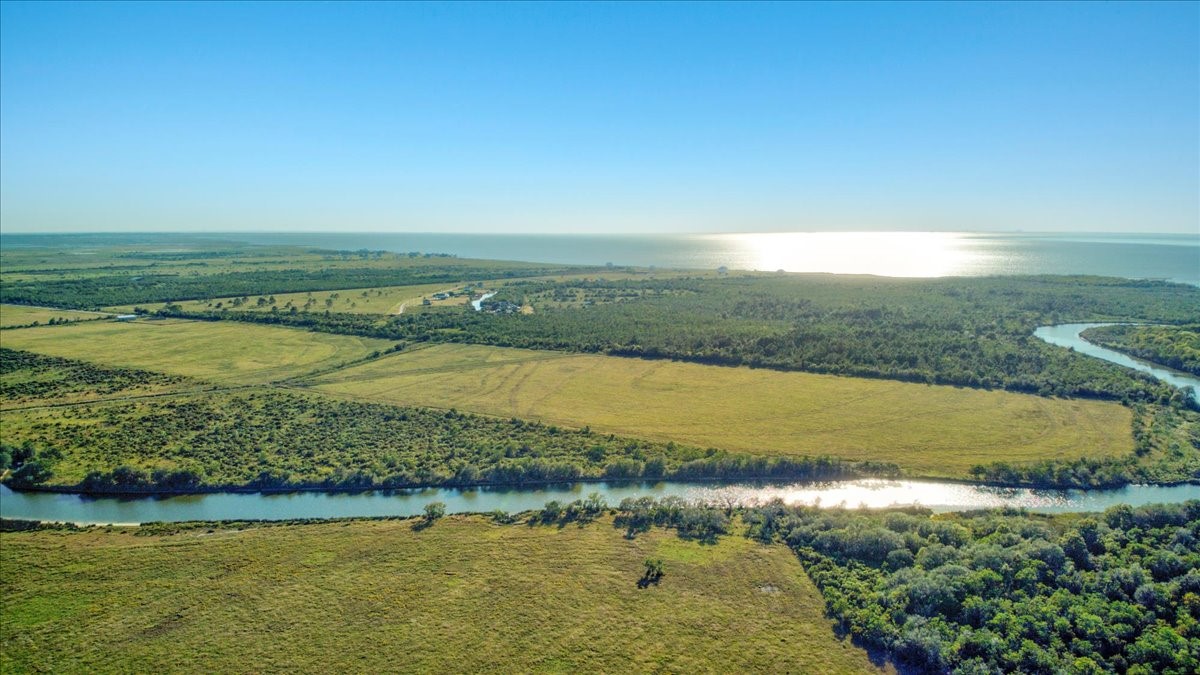 Tbd Gau Road Anahuac, TX 77514 - Photo 3 of 28 a view of a city with an ocean