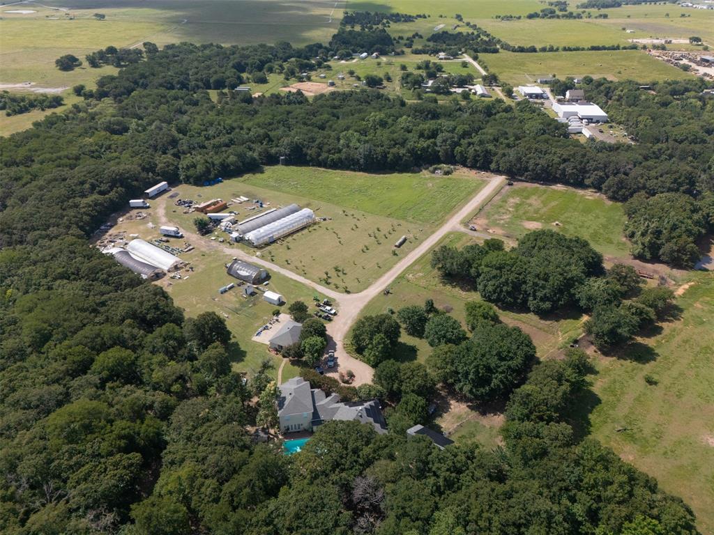 6529 Asher Road Alvarado, TX 76009 - Photo 1 of 39 an aerial view of a house with a yard