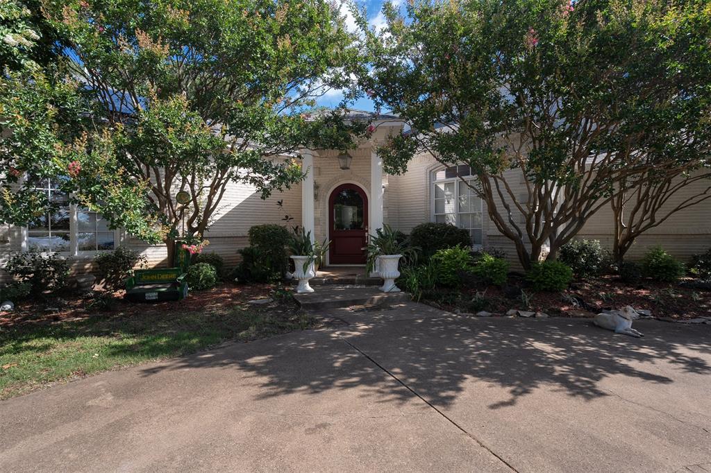 6529 Asher Road Alvarado, TX 76009 - Photo 16 of 39 a front view of a house with garden