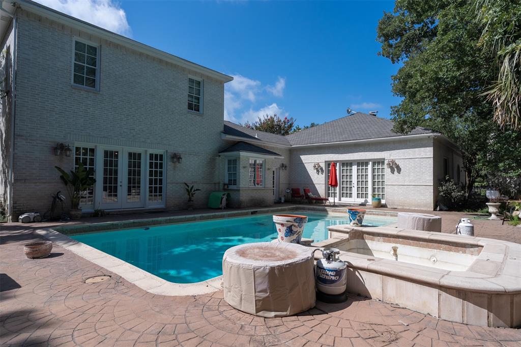 6529 Asher Road Alvarado, TX 76009 - Photo 18 of 39 a house view with a sitting space fire pit and outdoor space