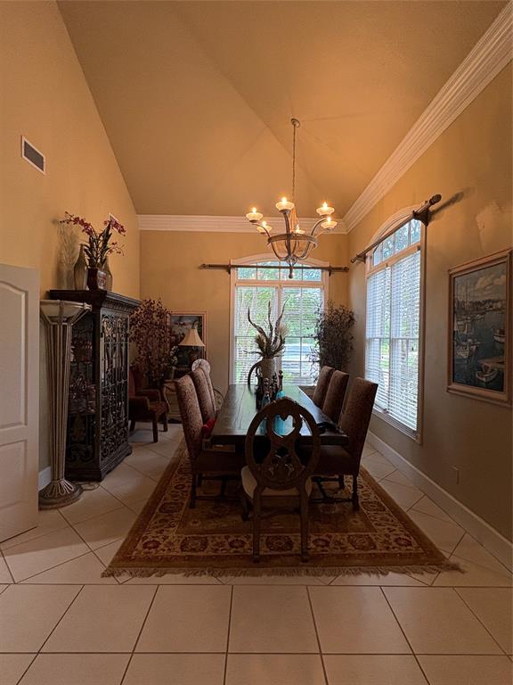 6529 Asher Road Alvarado, TX 76009 - Photo 23 of 39 a view of a dining room with furniture and chandelier