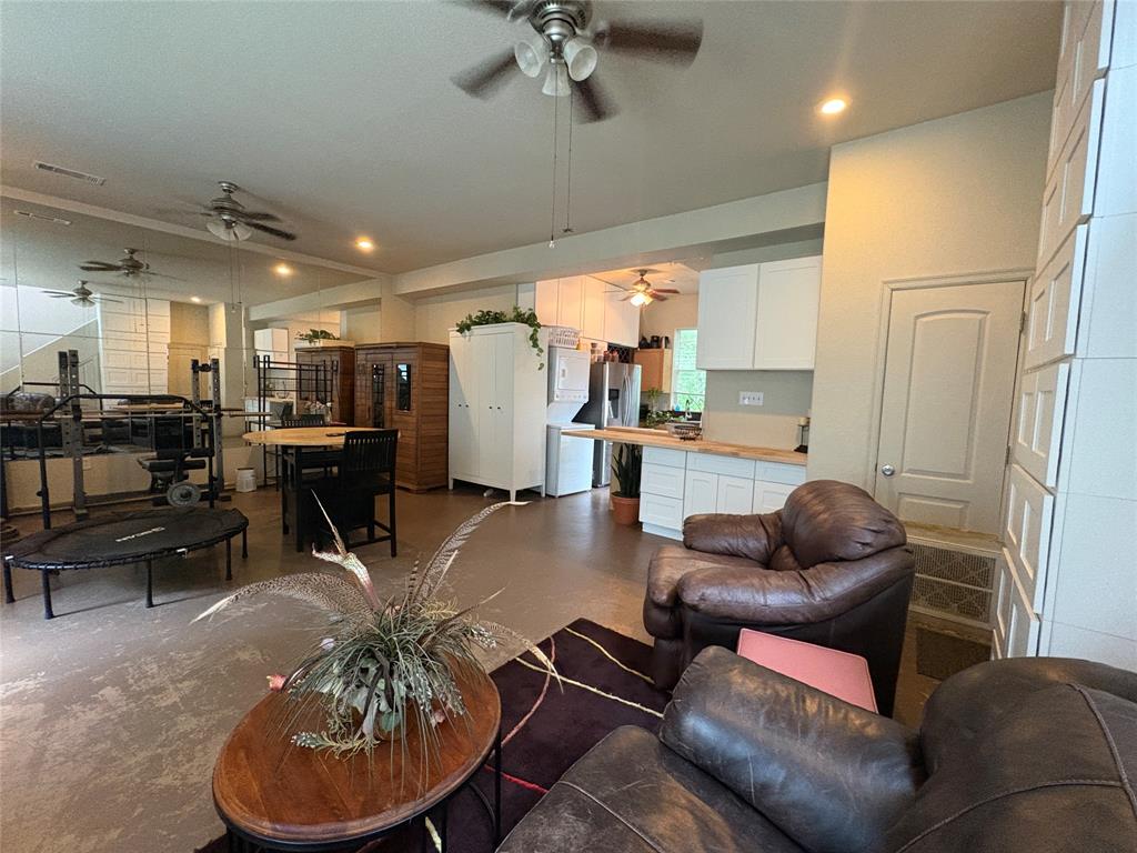 6529 Asher Road Alvarado, TX 76009 - Photo 35 of 39 a living room with furniture and kitchen view