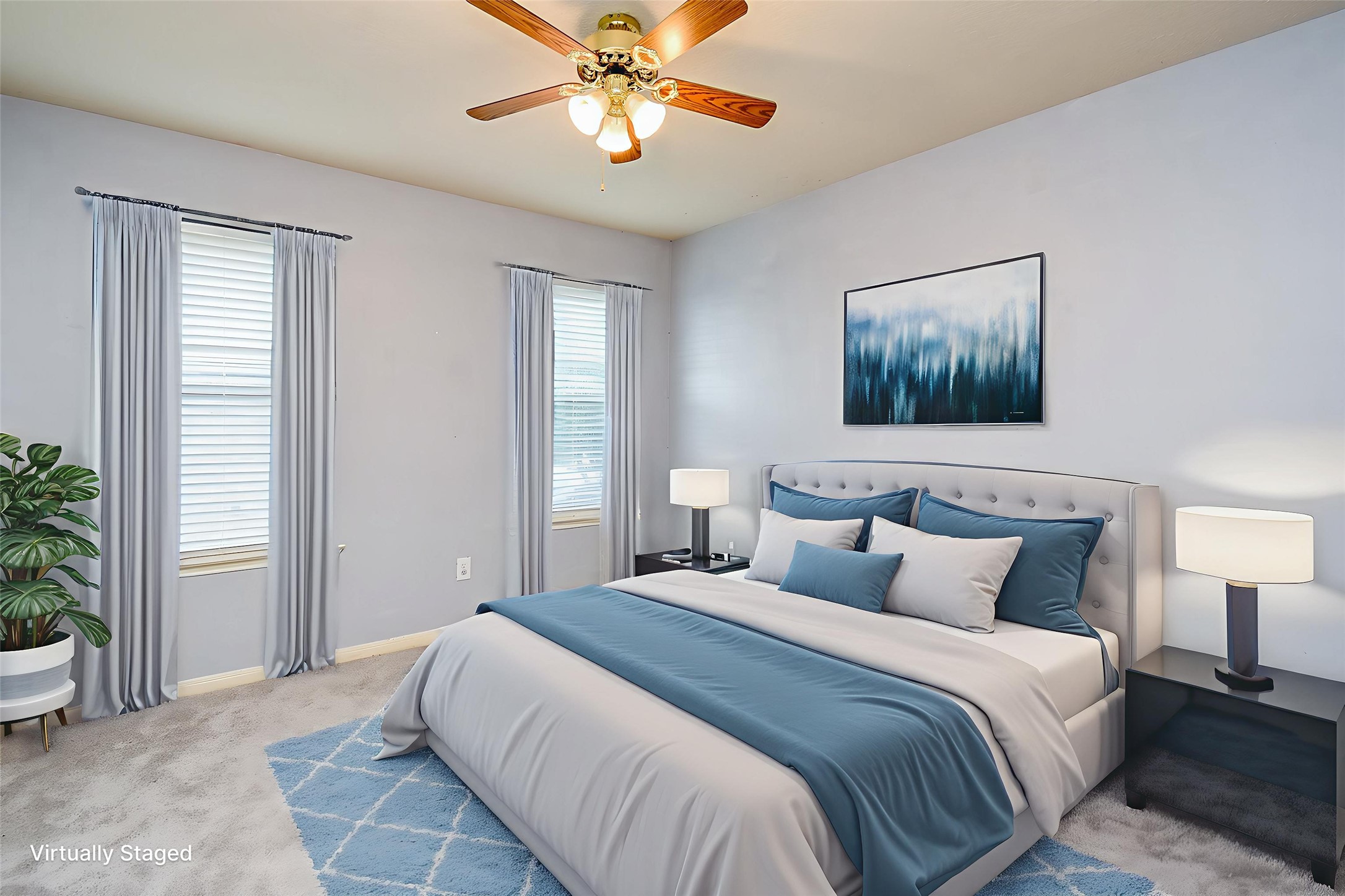 3918 Austin Lake Court Pearland, TX 77581 - Photo 20 of 32 a bedroom with a large bed and a chandelier