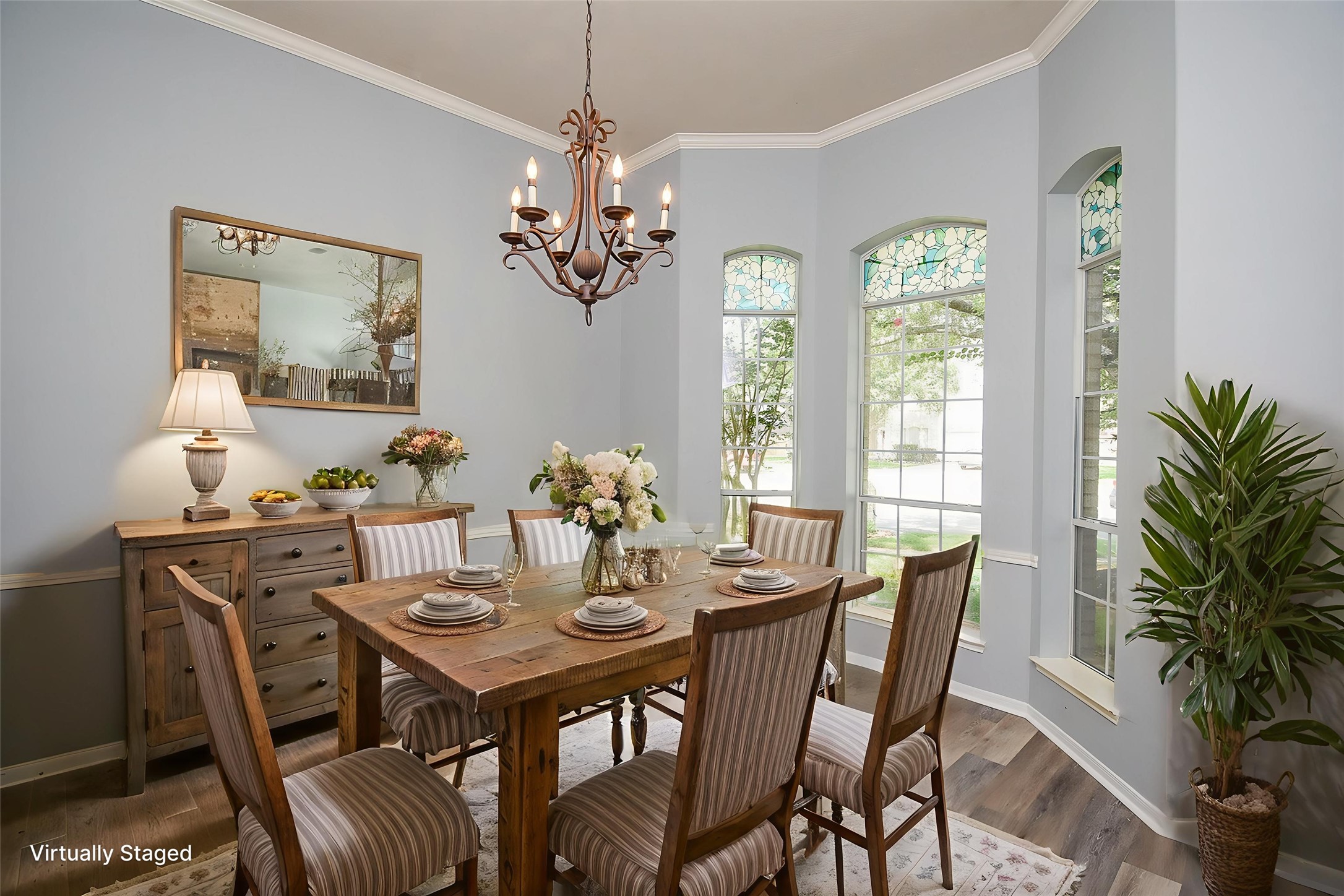 3918 Austin Lake Court Pearland, TX 77581 - Photo 2 of 32 a view of a dining room with furniture window and chandelier