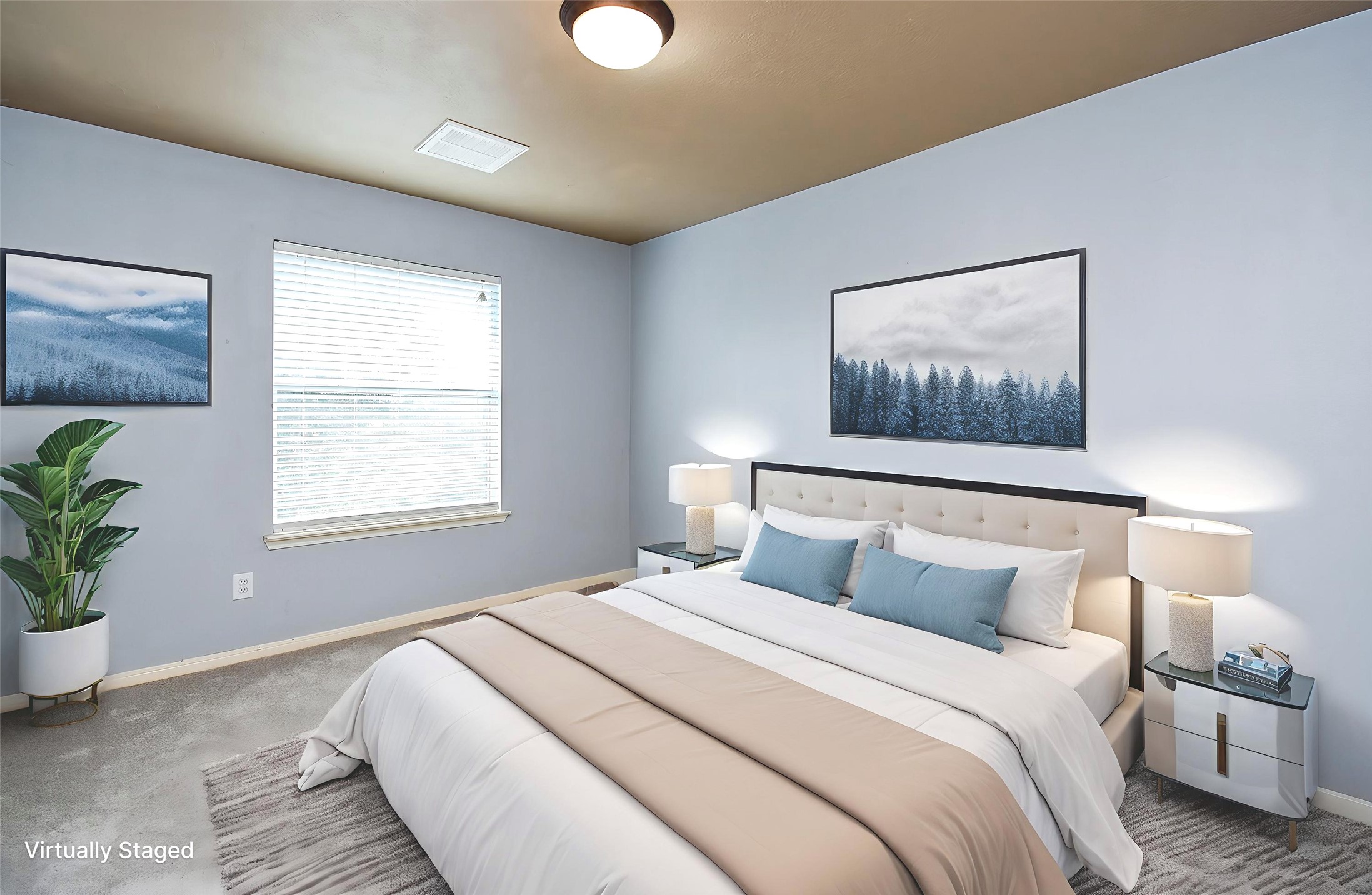 3918 Austin Lake Court Pearland, TX 77581 - Photo 22 of 32 a bedroom with bed and paintings on the wall