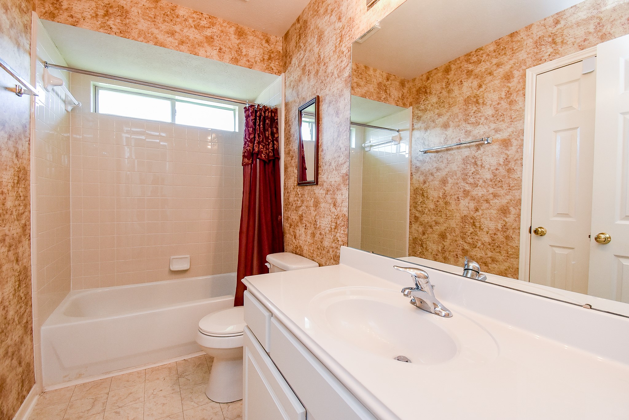 3918 Austin Lake Court Pearland, TX 77581 - Photo 25 of 32 a bathroom with a sink toilet and shower