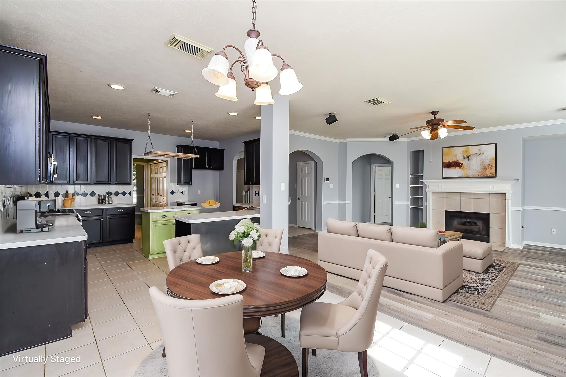 3918 Austin Lake Court Pearland, TX 77581 - Photo 8 of 32 a view of a dining room with furniture and a chandelier