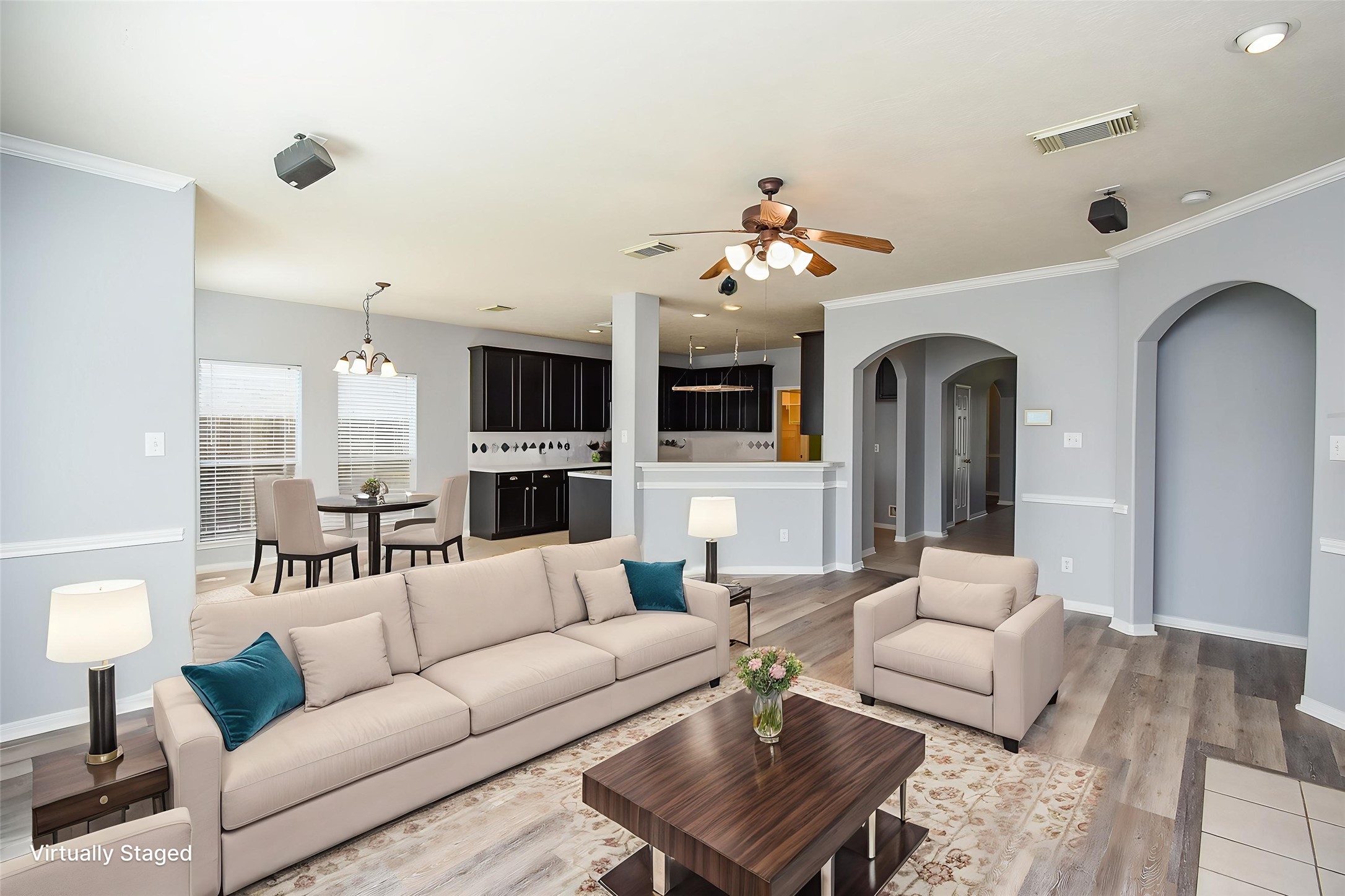 3918 Austin Lake Court Pearland, TX 77581 - Photo 10 of 32 a living room with furniture and a fireplace