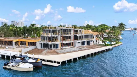 an aerial view of a house with outdoor space