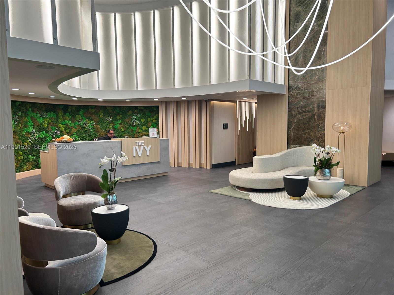 90 Southwest 3rd Street, Unit 3610 Miami, FL 33130 - Photo 17 of 38 a living room with furniture and a fireplace