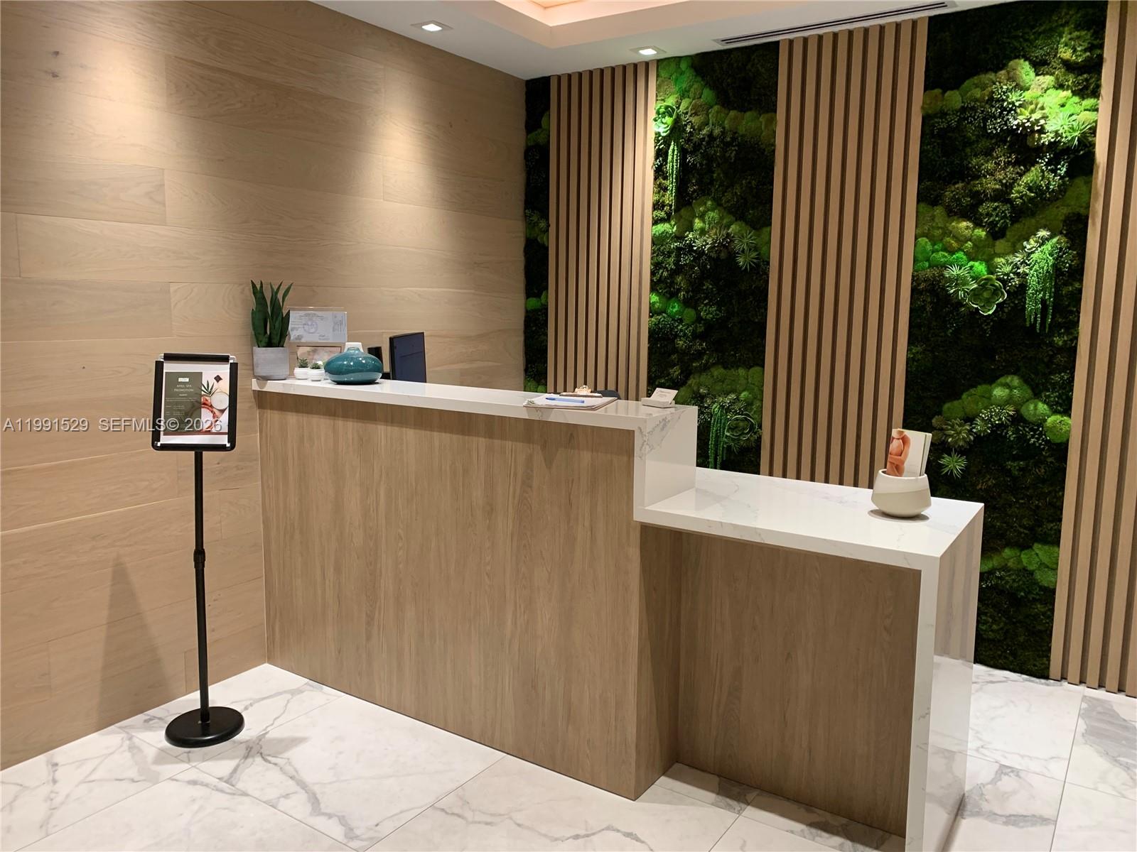 90 Southwest 3rd Street, Unit 3610 Miami, FL 33130 - Photo 29 of 38 a kitchen with a sink a refrigerator and a window