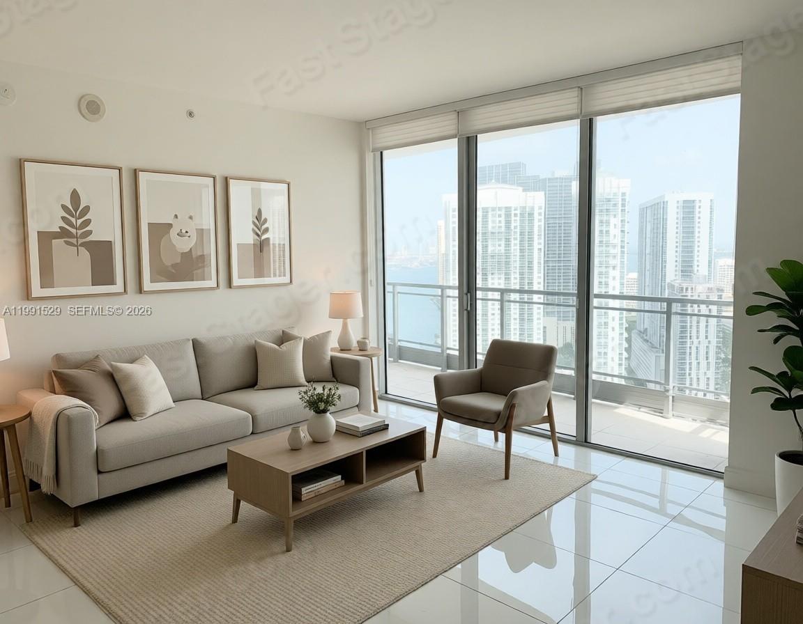 90 Southwest 3rd Street, Unit 3610 Miami, FL 33130 - Photo 3 of 38 a living room with furniture and a large window