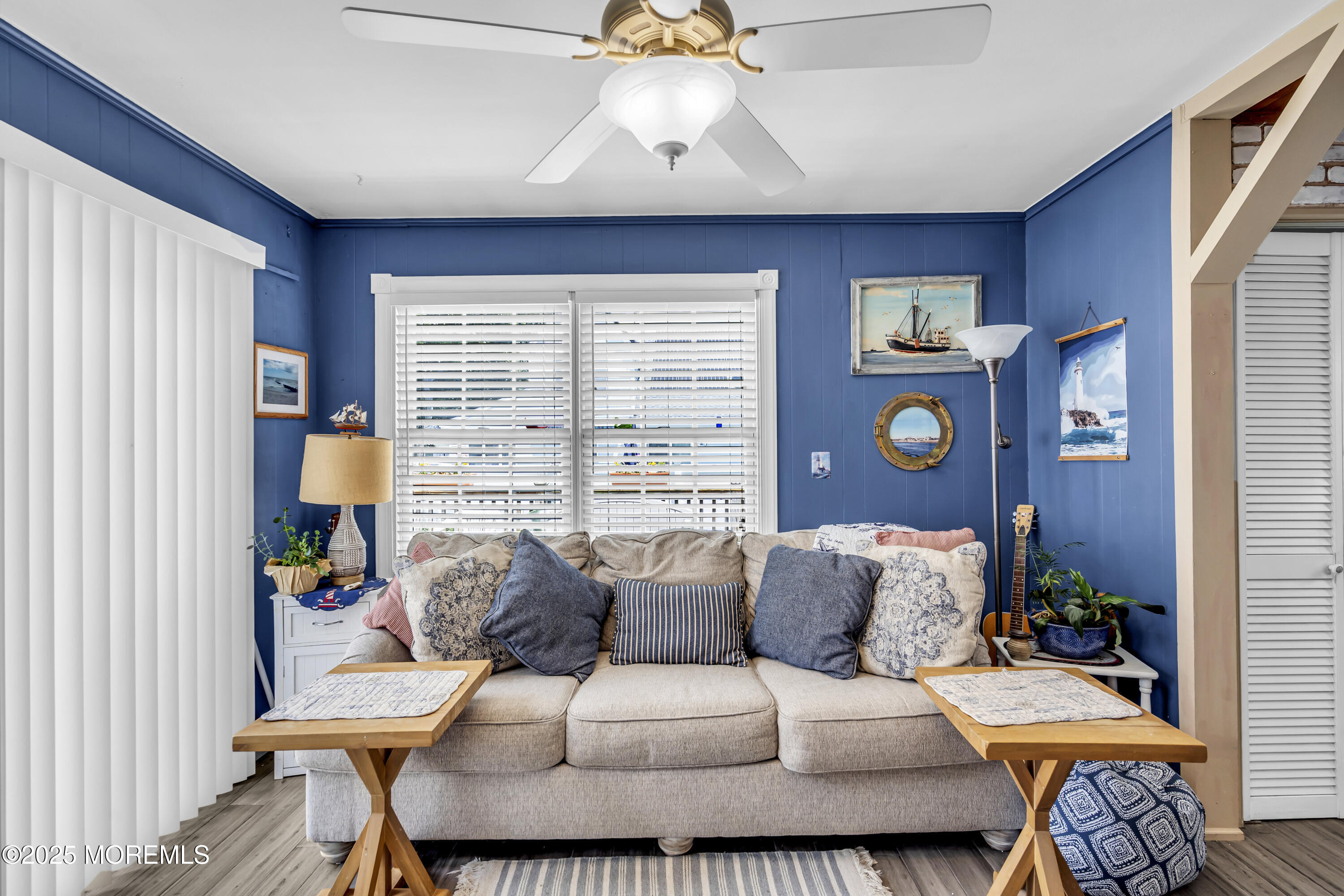 2221 Wilson Road Point Pleasant, NJ 08742 - Photo 20 of 63 a living room with furniture and a large window