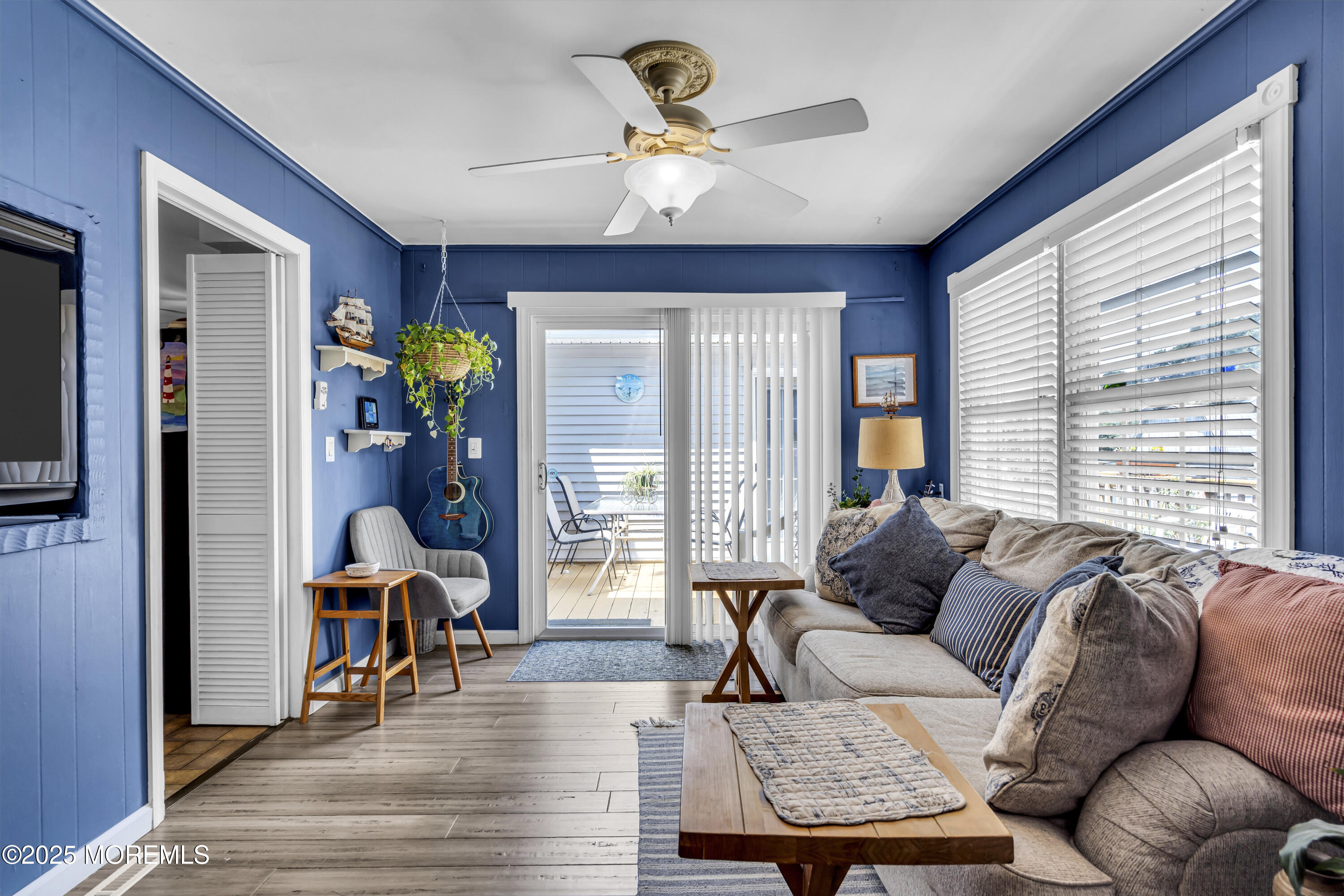 2221 Wilson Road Point Pleasant, NJ 08742 - Photo 22 of 63 a living room with furniture and wooden floor