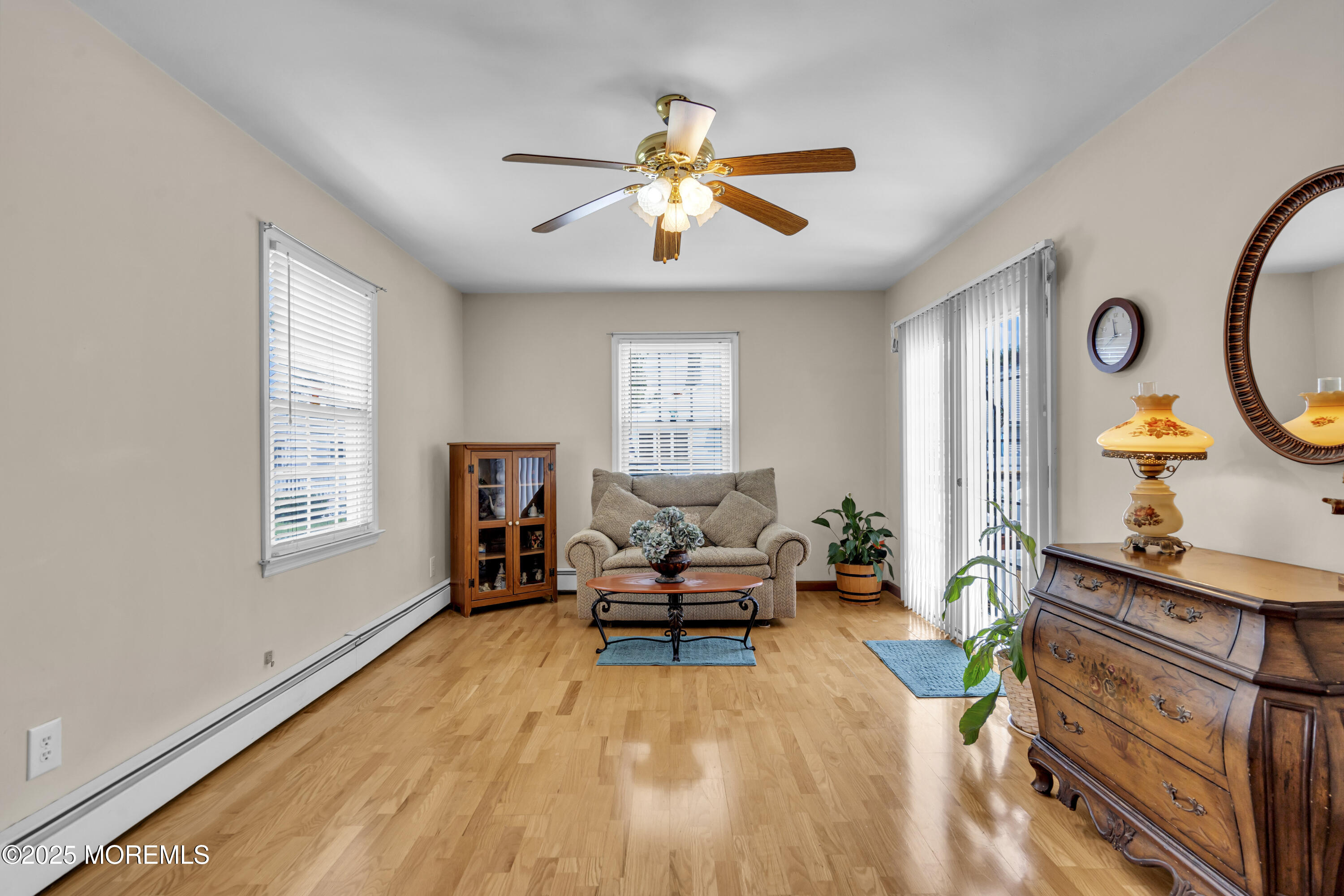 2221 Wilson Road Point Pleasant, NJ 08742 - Photo 26 of 63 a living room with furniture and a large window