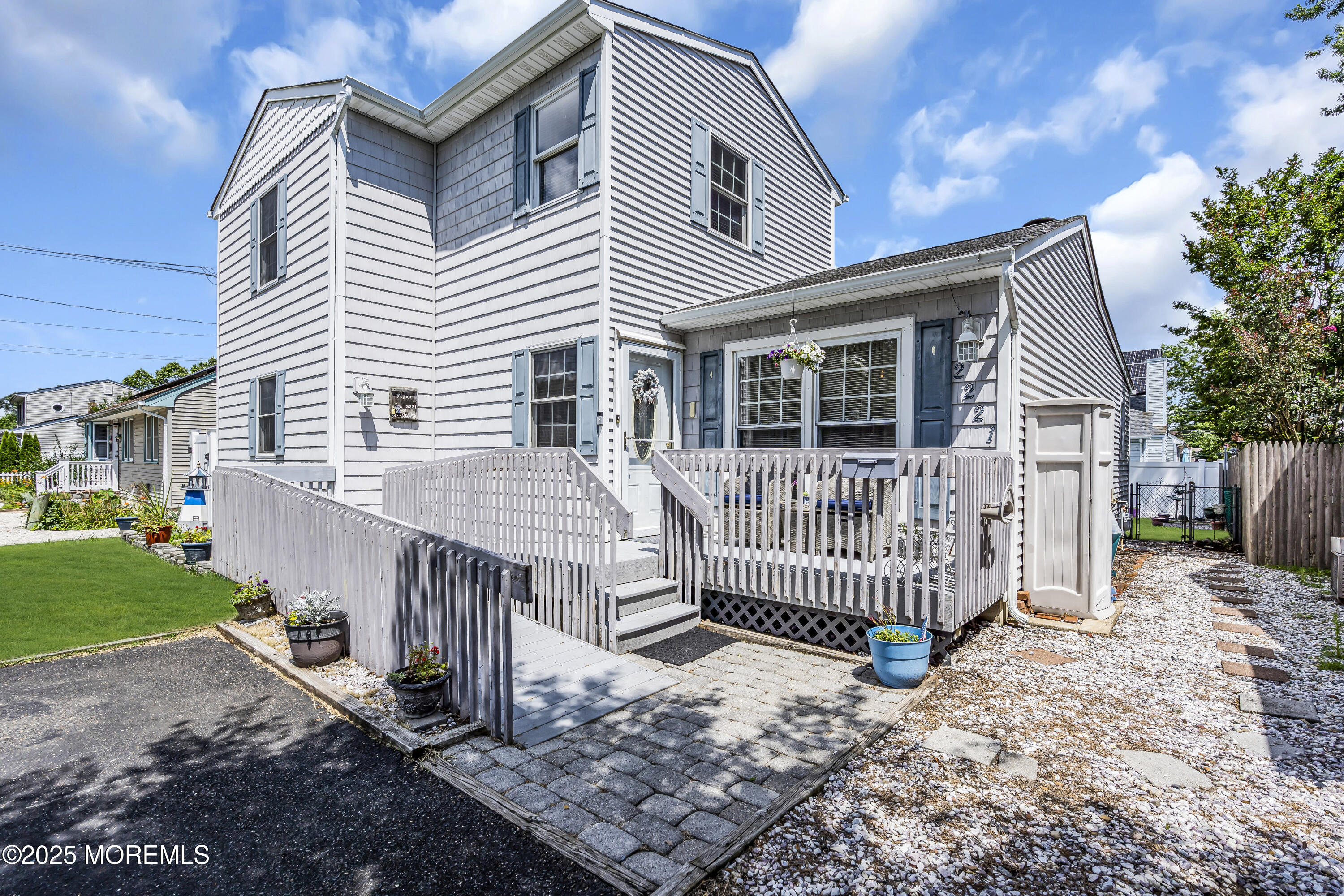 2221 Wilson Road Point Pleasant, NJ 08742 - Photo 3 of 63 a view of a house with a yard and a fence