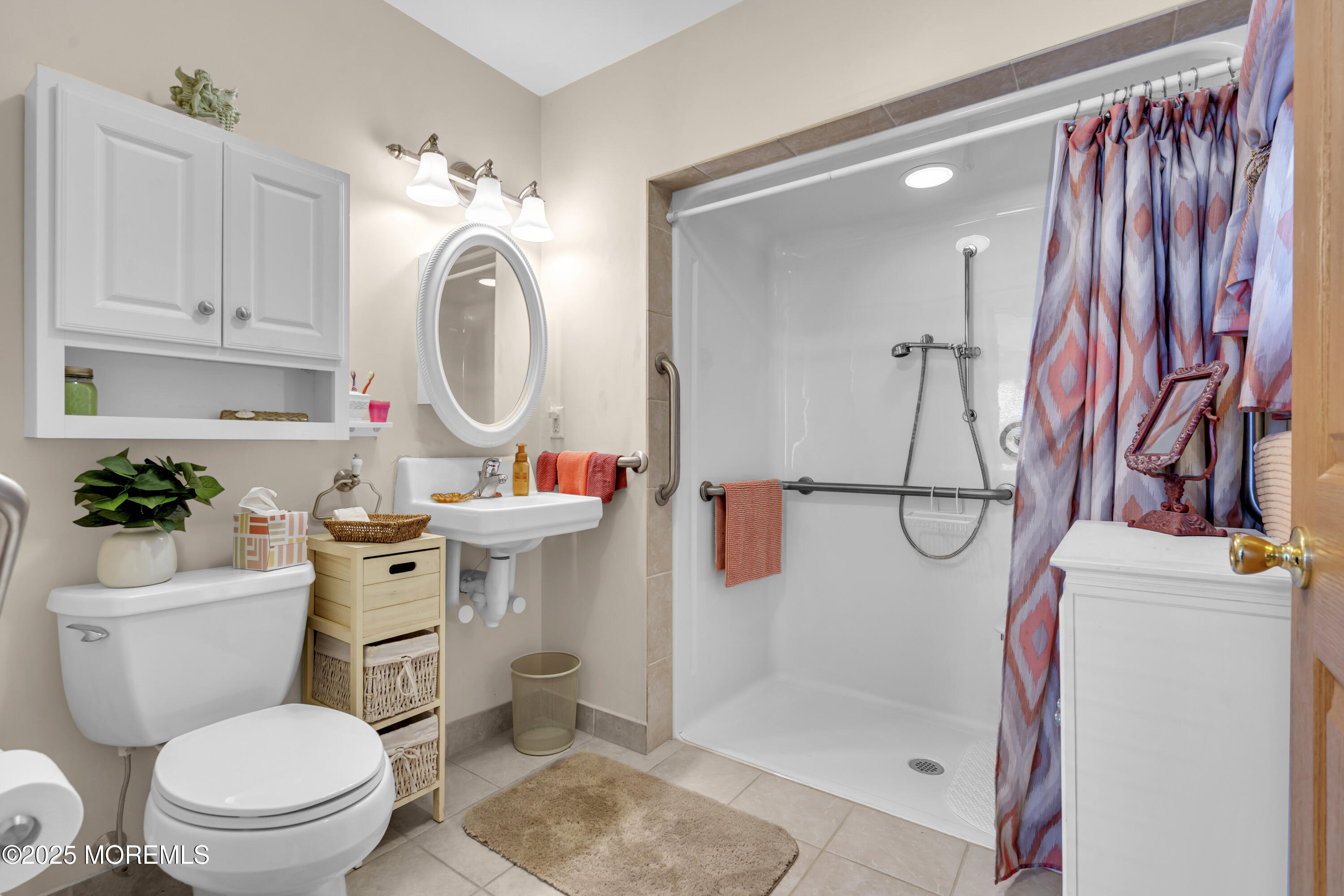 2221 Wilson Road Point Pleasant, NJ 08742 - Photo 31 of 63 a bathroom with a granite countertop sink mirror vanity and toilet